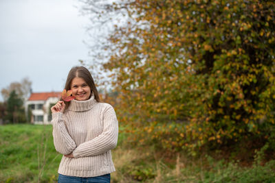 Portrait of a smiling young woman