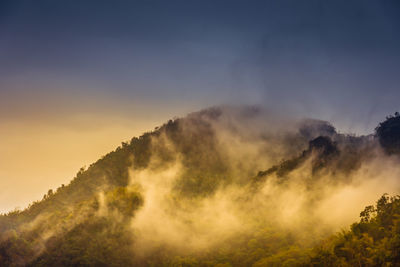 Scenic view of mountains against sky during sunset