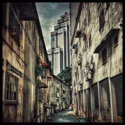 Narrow alley along buildings