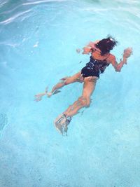 Woman swimming in pool