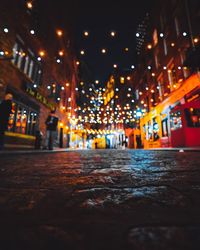 Illuminated street lights at night