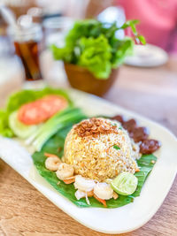 Close-up of food served on table