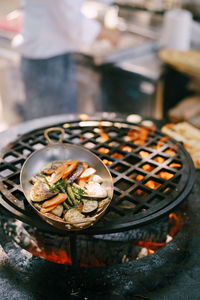 High angle view of meat on barbecue