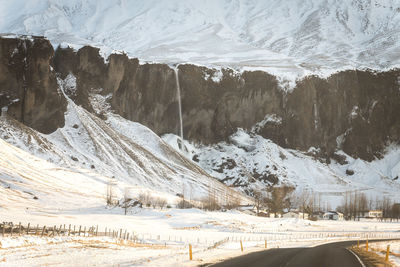 Scenic view of snowcapped mountains during winter