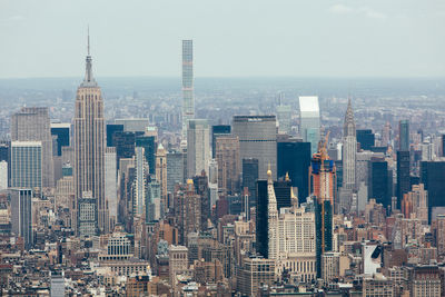 View of empire state building amidst cityscape