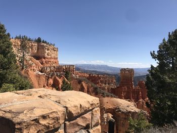 View of rock formations against sky