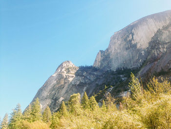 Scenic view of rocky mountains against clear sky