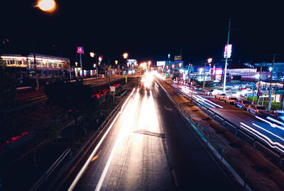 High angle view of light trails on road at night