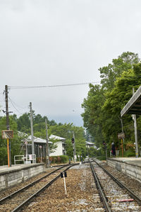 Train on railway tracks against clear sky