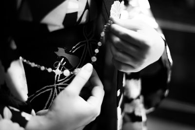 Close-up of woman holding hands