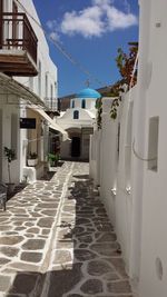 Narrow alley along houses