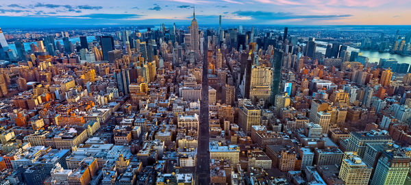 High angle view of modern buildings in city against sky,new york city