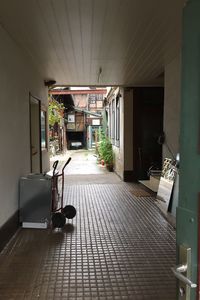 Empty alley amidst buildings