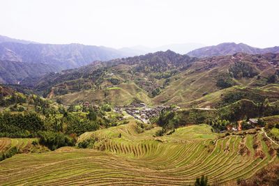 Scenic view of tree mountains against sky