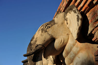 Low angle view of statue against clear sky