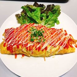 Close-up of served food in plate