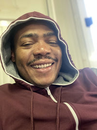 Close-up portrait of a smiling young man