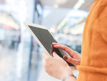 Close-up of person using mobile phone