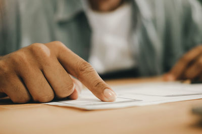 Close-up of a man on table