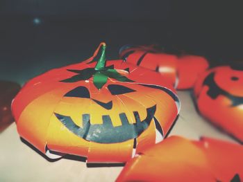 Close-up of artificial halloween pumpkins on flooring at home