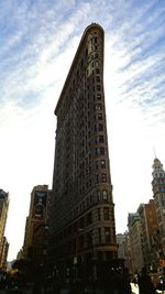 Low angle view of skyscrapers against sky