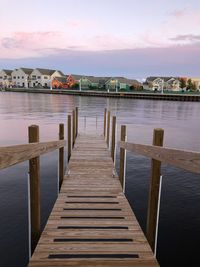 Pier over sea against sky