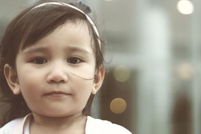 Close-up portrait of cute girl