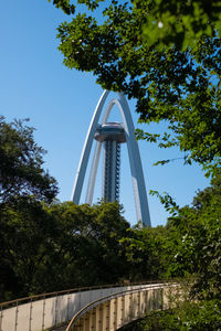 Low angle view of bridge against clear blue sky