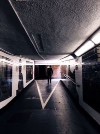 Woman walking in corridor