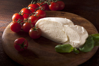 Close-up of tomatoes on cutting board