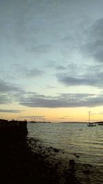 Scenic view of sea against sky at sunset