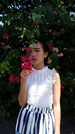 Girl standing on flower