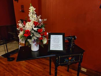 Flower vase on table at home