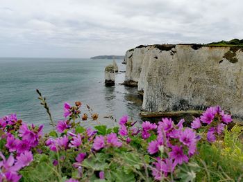 Scenic view of sea against cloudy sky