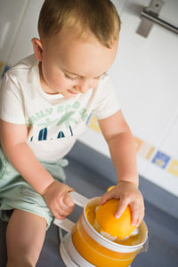 Boy playing with toys at home