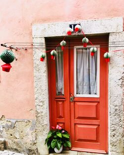 Red closed door of building