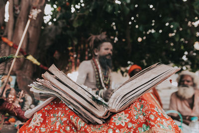 Group of people on book