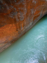 High angle view of rock formation in sea