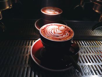 High angle view of coffee cup on table