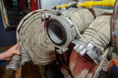 Close-up of person working on machine