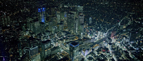 High angle view of city lit up at night,tokyo,japan