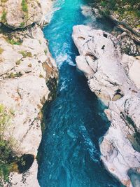 High angle view of rock formation in sea