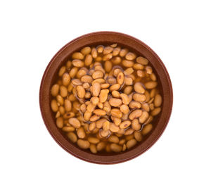 High angle view of eggs in bowl against white background