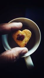 Close-up of person holding breakfast