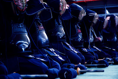 Kendo players sitting on floor