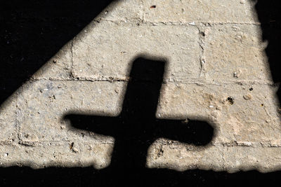 High angle view of shadow on wall