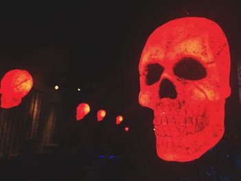 Red lantern against dark sky