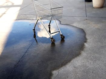 High angle view of puddle on wet street