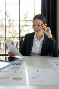 Businesswoman working at office