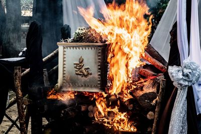 Bonfire on wooden log